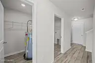 2905 Essex Street, Tarboro, NC 27886 — 4-bedroom home in Austin Pines, Tarboro, NC, photo 19 of 34: Back hall closet