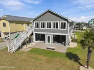 6075 6th Street, Surf City, NC 28445 — 3-bedroom waterfront home in Old Settlers Beach, Surf City, NC, photo 5 of 62: Back of House
