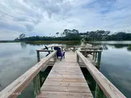 113 Wyndchase Lane, Beaufort, NC 28516 — 3-bedroom waterfront home in Graystone Landing, Beaufort, NC, photo 2 of 8: Pier Observation in Back Yard