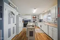 116 Zack Circle, Elizabeth City, NC 27909 — 4-bedroom manufactured home in Oak Stump Acres, Elizabeth City, NC, photo 5 of 27: kitchen
