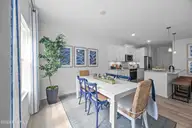 407 Loggerhead Boulevard, Surf City, NC 28445 — 3-bedroom home in Turtle Creek, Surf City, NC, photo 9 of 19: Pebble Dining Area (1)
