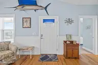 128 NE 8th Street, Oak Island, NC 28465 — 3-bedroom home, Oak Island, NC, photo 8 of 55: 10_entryway