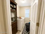 165 Pecan Lane, Aberdeen, NC 28315 — 4-bedroom home in Woodgreen, Aberdeen, NC, photo 7 of 9: laundry