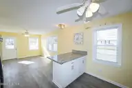 802 E Oak Island Drive, Oak Island, NC 28465 — 3-bedroom home in Long Beach, Oak Island, NC, photo 13 of 27: Kitchen-015-023-1500x1000