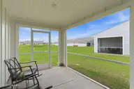 3165 Edgehill Drive, Leland, NC 28451 — 3-bedroom townhome in Lakes at Riverbend, Leland, NC, photo 15 of 34: 15-web-or-mls-Screened In Porch