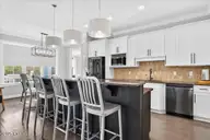 311 River Village Square, Shallotte, NC 28470 — 4-bedroom waterfront home in Rivers Edge, Shallotte, NC, photo 24 of 76: Kitchen with Island