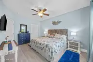 128 NE 8th Street, Oak Island, NC 28465 — 3-bedroom home, Oak Island, NC, photo 19 of 55: 23_bedroom