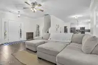 7177 Old Stump Drive SE, Leland, NC 28451 — 4-bedroom home in Cypress Bay, Leland, NC, photo 5 of 70: Spacious Living Room!