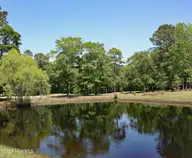6546 131 Castlebrook Way SW, Ocean Isle Beach, NC 28469 — lot in Ocean Ridge Plantation, Ocean Isle Beach, NC, photo 7 of 31: Water View on Castlebrook Way