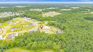 131 W Scarborough Court, Hampstead, NC 28443 — 5-bedroom waterfront home in Pecan Grove Plantation, Hampstead, NC, photo 14 of 28: 15-DJI_20250806004035_0009_D-Edit