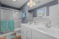 3302 Feldspar Court SW, Wilson, NC 27893 — 2-bedroom home in Cranberry Ridge, Wilson, NC, photo 13 of 18: Master bedroom walkin shower