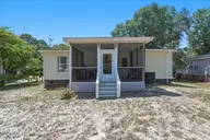 703 Dogwood Drive, Sunset Beach, NC 28468 — 3-bedroom manufactured home in Seaside Station, Sunset Beach, NC, photo 23 of 31