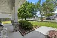 105 Pagoda Court, Hampstead, NC 28443 — 4-bedroom home in Dogwood Lakes, Hampstead, NC, photo 6 of 74: 14_frontyard