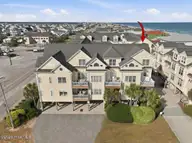 215 Summer Winds Place, Surf City, NC 28445 — 5-bedroom waterfront townhome in Summer Winds Townhomes, Surf City, NC, photo 1 of 55