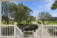 1031 Mallard Bay Road, Hampstead, NC 28443 — 4-bedroom waterfront home in Mallard Bay, Hampstead, NC, photo 4 of 72: 7_centered front porch exterior