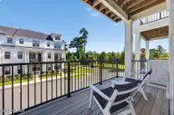 162 Dugger Lane, Wilmington, NC 28412 — 3-bedroom townhome in Riverlights Marina Village, Wilmington, NC, photo 11 of 73: Covered Balcony