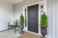 7177 Old Stump Drive SE, Leland, NC 28451 — 4-bedroom home in Cypress Bay, Leland, NC, photo 3 of 70: Front Entry