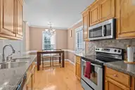 3302 Feldspar Court SW, Wilson, NC 27893 — 2-bedroom home in Cranberry Ridge, Wilson, NC, photo 10 of 18: Kitchen and dining full view