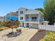 105 SE 17th Street, Oak Island, NC 28465 — 4-bedroom home in Tranquil Harbor, Oak Island, NC, photo 1 of 72