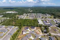 303 Coastal Reef Court, Holly Ridge, NC 28445 — 3-bedroom townhome in Coastal Village, Holly Ridge, NC, photo 23 of 25: Coastal Village - Exterior_Aerials _36