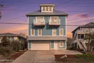 1617 S Shore Drive, Surf City, NC 28445 — 8-bedroom waterfront home in Sandy Ridge, Surf City, NC, photo 2 of 62: 2_1617_s_shore_dr_002