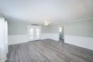 802 E Oak Island Drive, Oak Island, NC 28465 — 3-bedroom home in Long Beach, Oak Island, NC, photo 9 of 27: Family Room-016-028-1500x1000