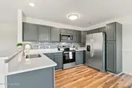 221 Cherry Blossom Drive, Richlands, NC 28574 — 3-bedroom home in Cherry Grove, Richlands, NC, photo 4 of 48: Kitchen