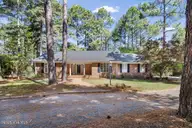 30 Birdie Drive, Whispering Pines, NC 28327 — 3-bedroom home in Whispering Pines, Whispering Pines, NC, photo 1 of 26