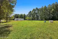 297 Mallard Roost Drive, Burgaw, NC 28425 — 3-bedroom manufactured home in Mallard Roost, Burgaw, NC, photo 3 of 22: IMG_2153