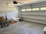 1002 Brighton Drive, New Bern, NC 28562 — 3-bedroom home in Carolina Colours, New Bern, NC, photo 15 of 16: Garage