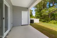 238 Cline Way Unit 126, Beaufort, NC 28516 — 3-bedroom townhome in 1809 Live Oak, Beaufort, NC, photo 20 of 44: Covered Patio with Storage