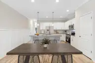 238 Cline Way Unit 126, Beaufort, NC 28516 — 3-bedroom townhome in 1809 Live Oak, Beaufort, NC, photo 2 of 44: Kitchen- Open Concept to Dining & Living