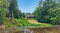 268 Price Road, Selma, NC 27576 — 3-bedroom waterfront home, Selma, NC, photo 4 of 39: 59-web-or-mls-DJI_20260819150309_0029_D