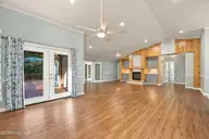 6207 Gondolier Drive, New Bern, NC 28560 — 3-bedroom waterfront home in Fairfield Harbour, New Bern, NC, photo 10 of 49: Open living and dining psace