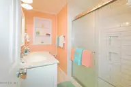 802 E Oak Island Drive, Oak Island, NC 28465 — 3-bedroom home in Long Beach, Oak Island, NC, photo 16 of 27: Bathroom-019-012-1500x1000
