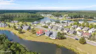 4070 Reunion Pointe Lane, New Bern, NC 28562 — 4-bedroom waterfront home in Carolina Colours, New Bern, NC, photo 5 of 49: 15-web-or-mls-DJI_20251007121701_0313_D