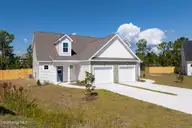 303 Coastal Reef Court, Holly Ridge, NC 28445 — 3-bedroom townhome in Coastal Village, Holly Ridge, NC, photo 1 of 25: Coastal Village - Exterior_Aerials _5