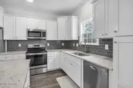 7177 Old Stump Drive SE, Leland, NC 28451 — 4-bedroom home in Cypress Bay, Leland, NC, photo 21 of 70: 20-Final 7177 Old Stump Dr Leland-RJREM-