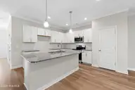 238 Cline Way Unit 126, Beaufort, NC 28516 — 3-bedroom townhome in 1809 Live Oak, Beaufort, NC, photo 7 of 44: Open Kitchen with Island