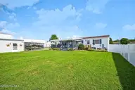 116 Zack Circle, Elizabeth City, NC 27909 — 4-bedroom manufactured home in Oak Stump Acres, Elizabeth City, NC, photo 23 of 27: back yard