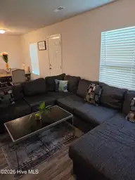 3302 Taylors Pointe Drive, Winterville, NC 28590 — 4-bedroom home in Taylor's Pointe, Winterville, NC, photo 3 of 29: Open living room view 2