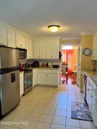 414 Ash Lily Court, Nashville, NC 27856 — 3-bedroom home in Cottonwood, Nashville, NC, photo 9 of 25: 414AshKitchenDining