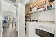 6075 6th Street, Surf City, NC 28445 — 3-bedroom waterfront home in Old Settlers Beach, Surf City, NC, photo 20 of 62: Laundry & Storage Closet