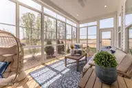1069 Fawn Valley Way, Wilmington, NC 28409 — 4-bedroom home in Fawn Valley, Wilmington, NC, photo 24 of 28: 31 HHHunt Homes Retreat Covered Porch