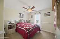 116 Zack Circle, Elizabeth City, NC 27909 — 4-bedroom manufactured home in Oak Stump Acres, Elizabeth City, NC, photo 12 of 27: bedroom 2