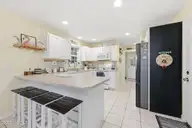 805 Driftwood Drive, Hampstead, NC 28443 — 3-bedroom waterfront home in Driftwood at Tropical, Hampstead, NC, photo 12 of 56: 31-web-or-mls-_RAD5932