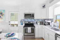 4327 E Beach Drive, Oak Island, NC 28465 — 3-bedroom waterfront home in Long Beach, Oak Island, NC, photo 14 of 47: 4327 E Beach 13