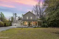 209 Sand Dollar Lane, Hampstead, NC 28443 — 3-bedroom home in Hideaway Shores, Hampstead, NC, photo 1 of 61: 1_virtual twilight