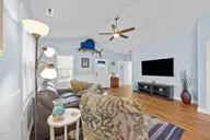 128 NE 8th Street, Oak Island, NC 28465 — 3-bedroom home, Oak Island, NC, photo 11 of 55: 13_living room