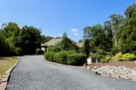 7 Bobolink Road, Jackson Springs, NC 27281 — 3-bedroom home in Foxfire Village, Jackson Springs, NC, photo 13 of 66: BLUE STONE DRIVEWAY